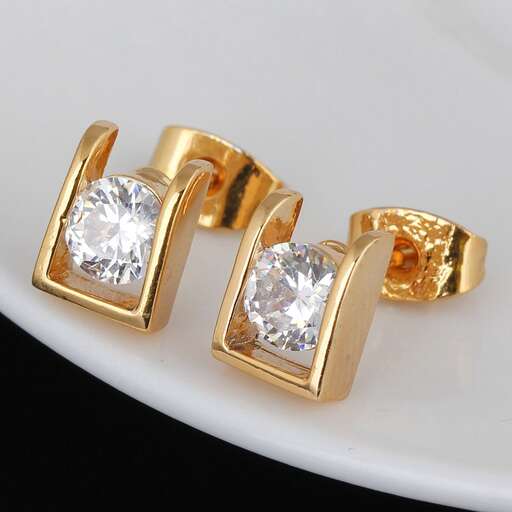 a pair of yellow gold and diamond ring