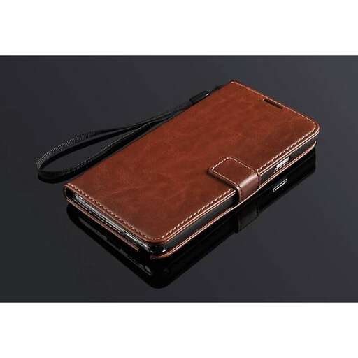 a brown leather wallet with a black strap.