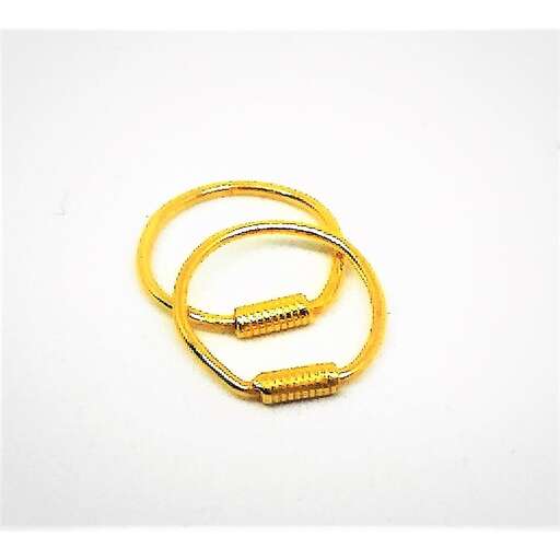 a pair of gold bangle