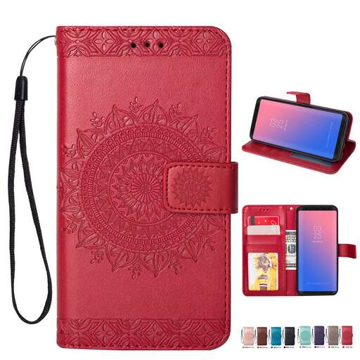a pink leather case with a floral design.
