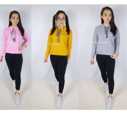 the top is a long sleeved top with a hoodie and a sweater.