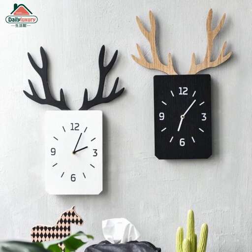 a wall with a clock and a plant on it.