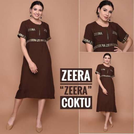 a dress that is very short and has a long neckline and is very short sleeves.