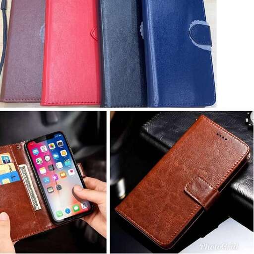 a person holding a wallet and a cell phone.