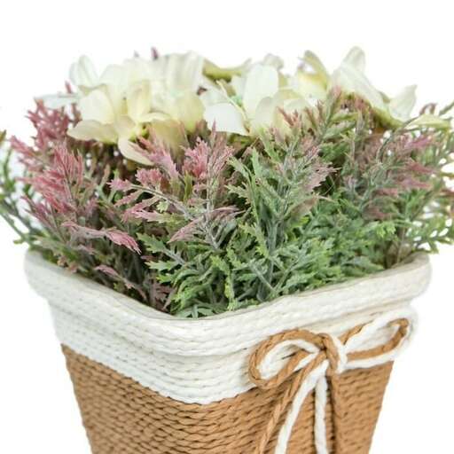 a basket of flowers on a white background