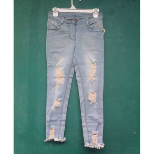 a pair of blue jeans with a white tag on the front.