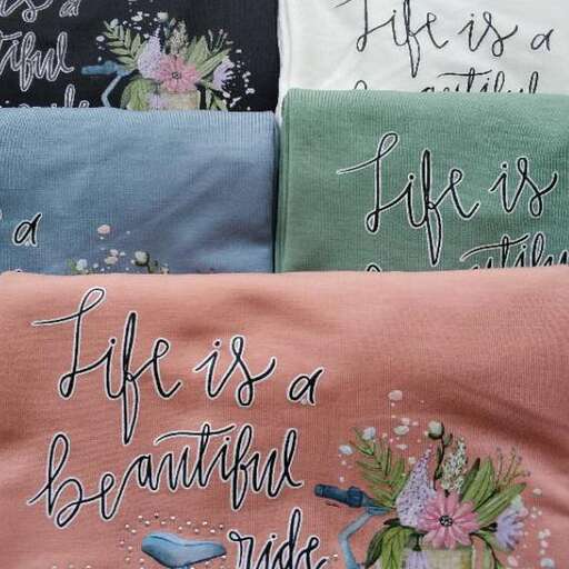 a beautiful blanket with flowers and a beautiful smile