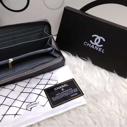 a bag that is sitting on a white rug.