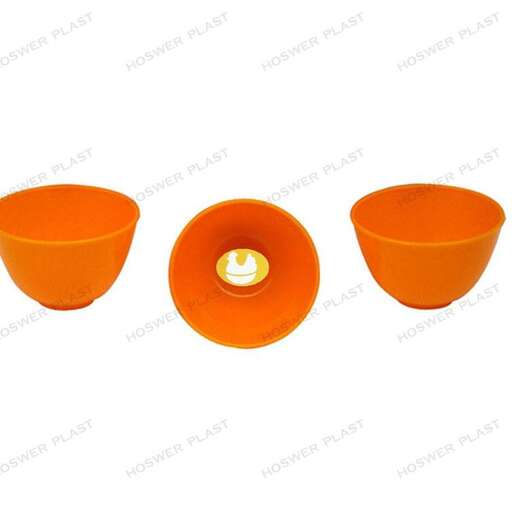 set of orange bowls with a white background