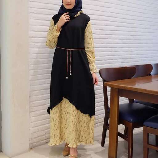 a woman in a black dress