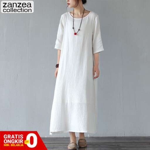long white dress in the form of a long sleeved dress