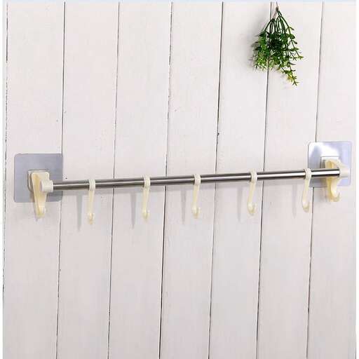 a rack with a plant hanging on it.