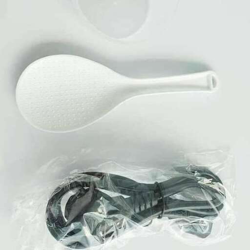 a pair of spoons in plastic wrap.