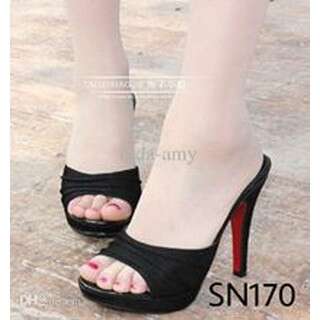 black high heeled shoes with a red heel