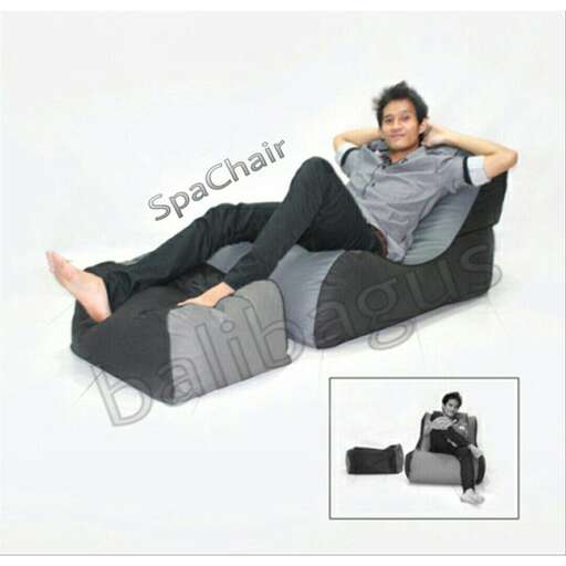 man laying on a bean bag chair