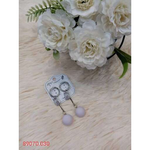 white roses in a silver plated vase