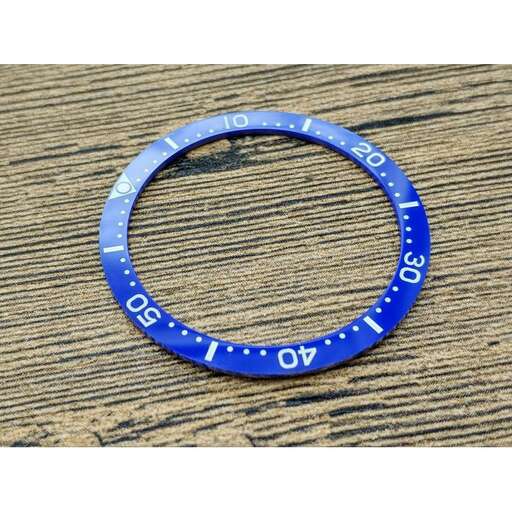 a bracelet made of recycled plastic and metal.