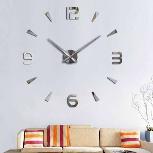 a wall clock with a couch and a couch