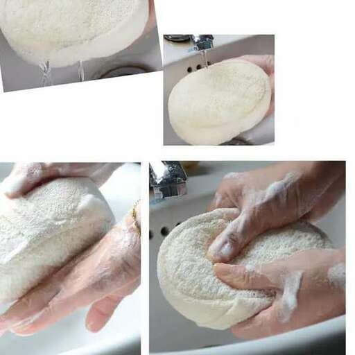 a person washing a dough in a sink.