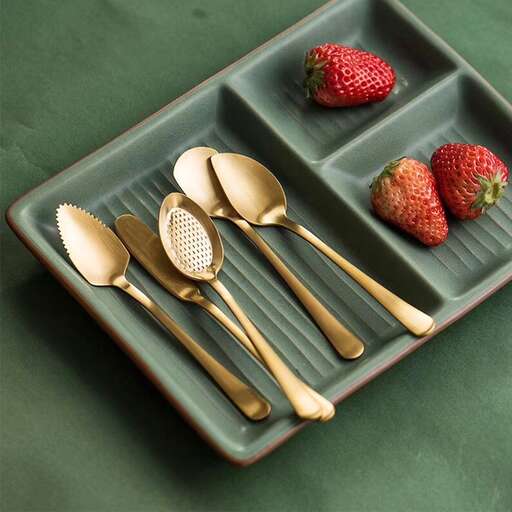 a tray with two spoons and two spoons.