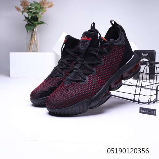 a shoe that is on a table next to a basket.