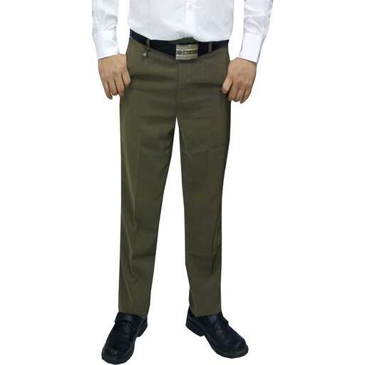 a man in a white shirt and green pants