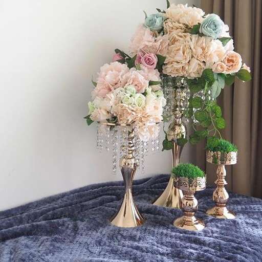 a table with a vase of flowers on it.