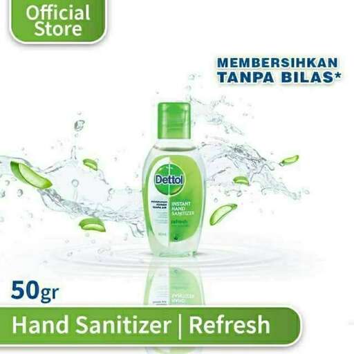 a bottle of hand soap is being sprayed with a bottle of water.