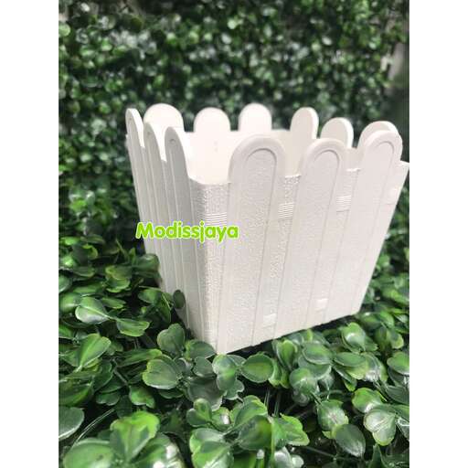 a white picket fence with a white picket fence.