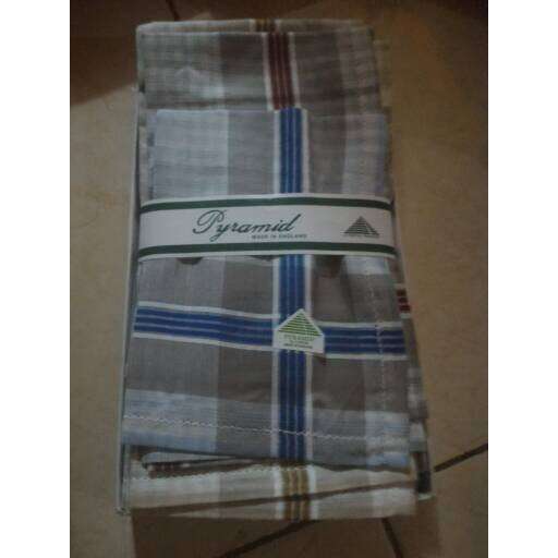 the bag is made of a tartan fabric.