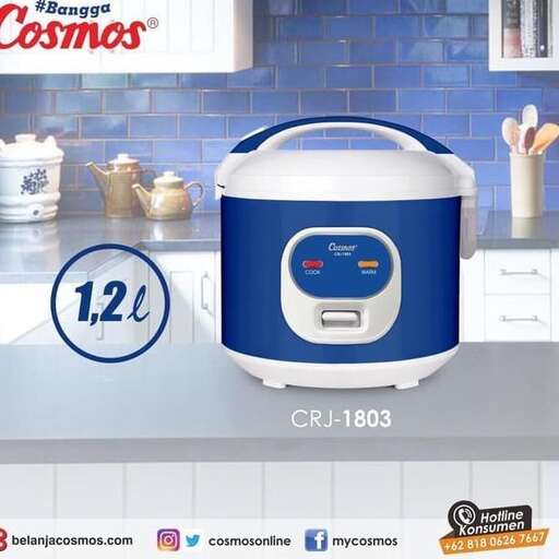 a blue and white crock pot on a counter top.