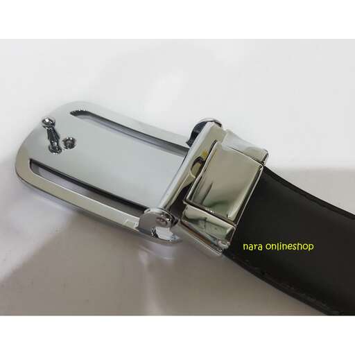 a close up of a watch with a strap