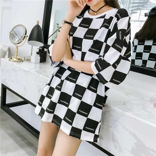 person in a black and white dress