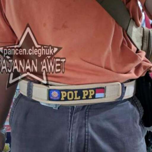 the belt is made of leather and the belt is made of metal.