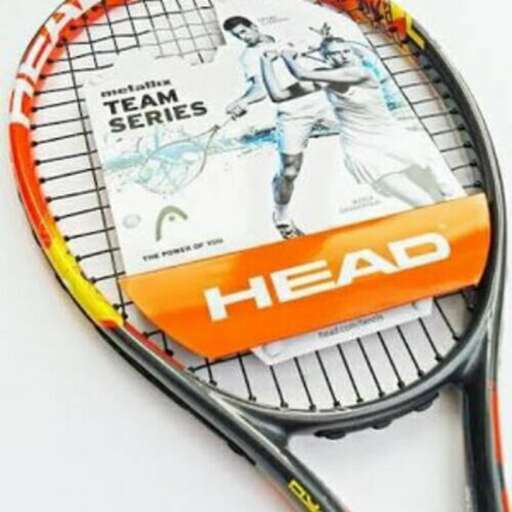 a tennis racket with a picture of a tennis player on it.