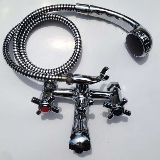 a faucet and a sink faucet with a faucet and a chain.