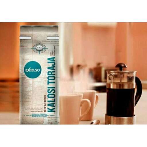 a bottle of coffee on a counter top.