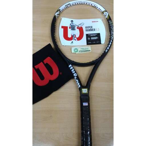 a tennis racket with a black handle and a flag