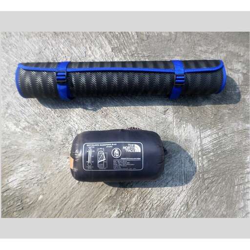 a black and blue case with a strap.