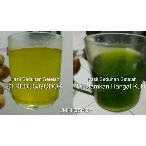a glass of green juice