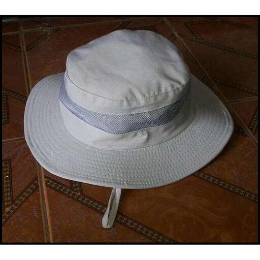 a hat on a tile floor