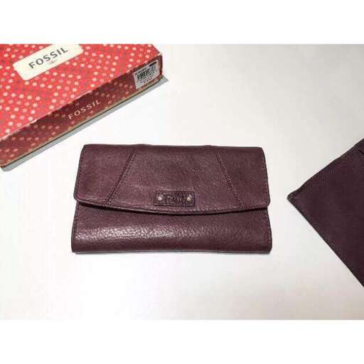 a small wallet with a small pocket in it.