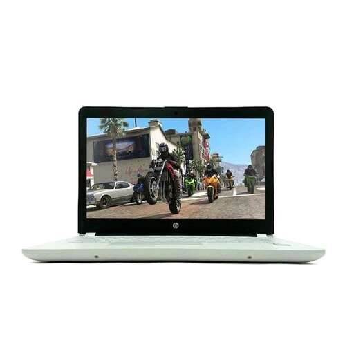 a laptop computer with a picture of a man on the screen.