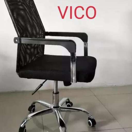 a chair that is sitting in the middle of a room.