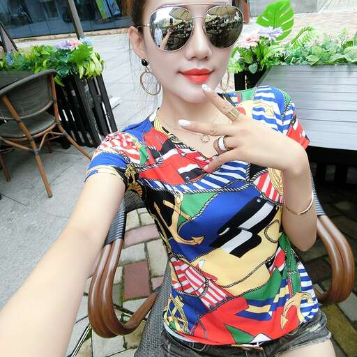 a girl in a colorful shirt