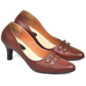 brown suede shoes with a white stripe.