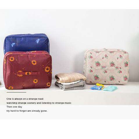 a suitcase and a bag sitting on a table.