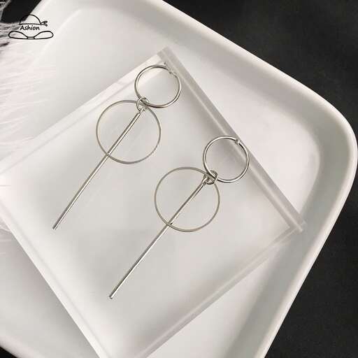a pair of glasses sitting on a white tray.
