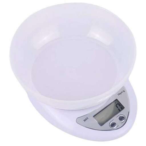 a scale that is white with a digital display.