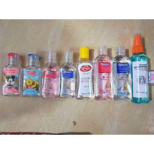 a collection of bottles that are lined up.